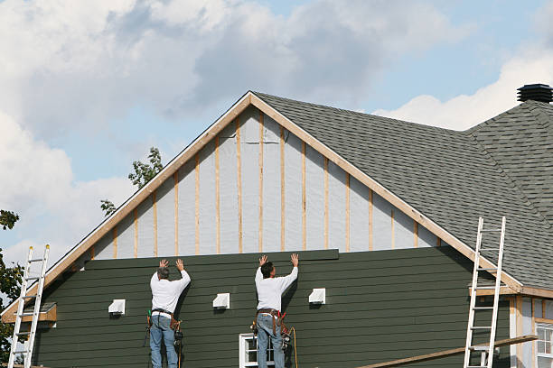 Professional Siding technician working in Hudson, MA